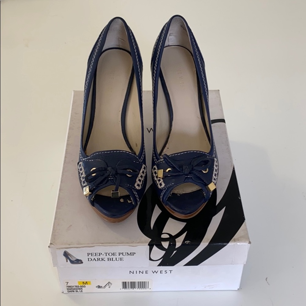 Navy peep-toe pumps